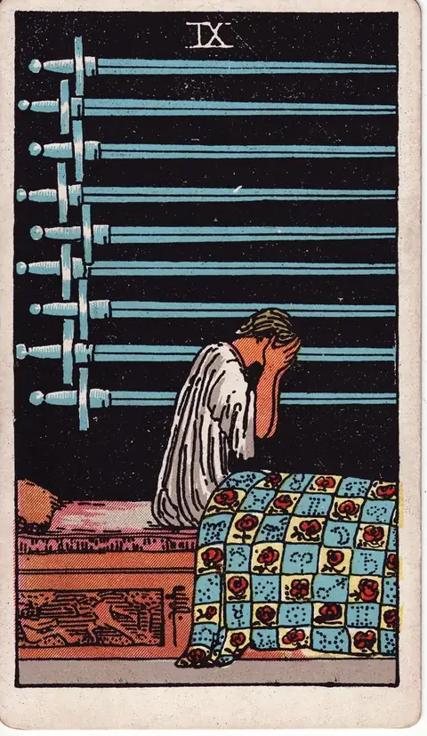 Carta de tarot Nove de Espadas